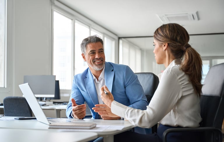 Two older executives team business people man and woman working at office corporate meeting